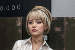 a_person_in_a_professional_office_setting_holding_a_folder_